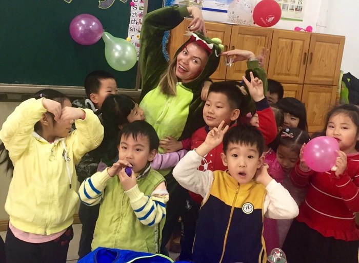Alisa with young students